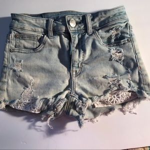 Juniors denim shorts with white lace front pockets